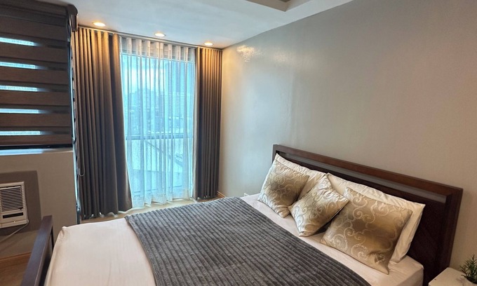 Wack-Wack Greenhills Condominio | Fantastic 2-bedroom condo with AC IN BSA TWIN TOWER