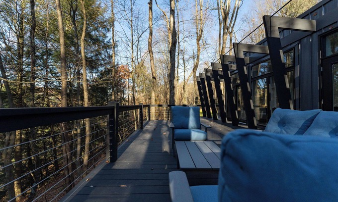 Loudonville Cabina | Fauna Bluff, A cliffside 2-bedroom modern cottage overlooking a bubbling stream.