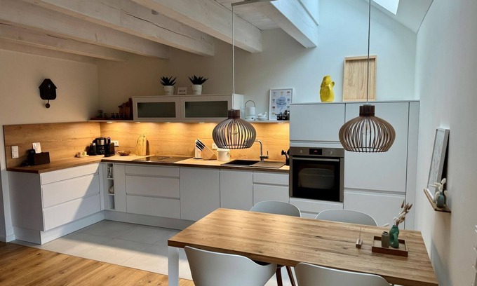 Rysum Apartamento | "Fenja" - Cozy maisonette apartment with terrace in the historic courtyard in Rysum -