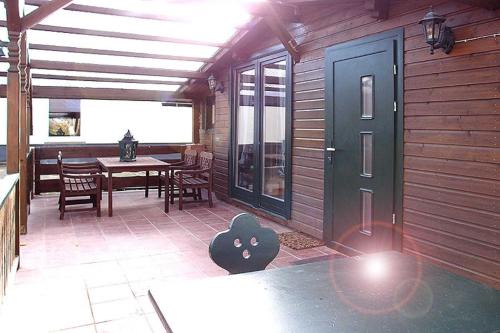 Muritz Casa | Ferienhaus Ellie mit Bootscharter auf der Müritz