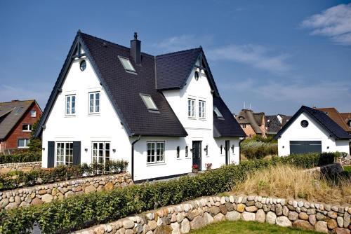 Wenningstedt-Braderup Casa | Ferienhaus Horsa Hoog - Luxus, Lage, Leichtigkeit mit Wellenrauschen in Wenningstedt Sylt