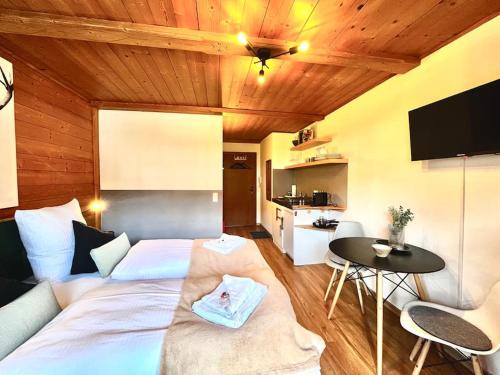 Schliersee Apartamento | Ferienwohnung Alpenglühen - mit Sauna & Frühstück
