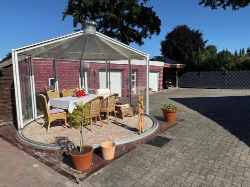Rhauderfehn Apartamento | Ferienwohnung Bettina 95171