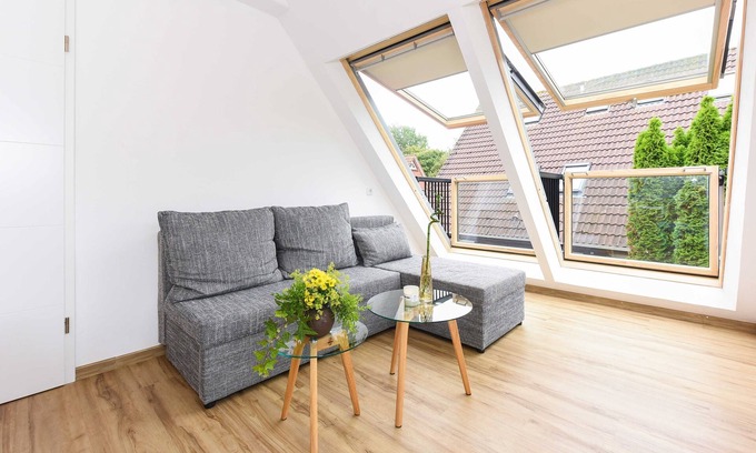 Neuharlingersiel Apartamento | Ferienwohnung Flut - Meeresleuchten in Neuharlingersiel