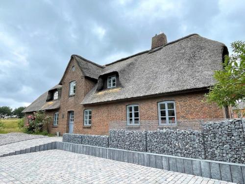 Ockholm Apartamento | Ferienwohnung Gotteskoog im Reetdachhaus Bongsiel