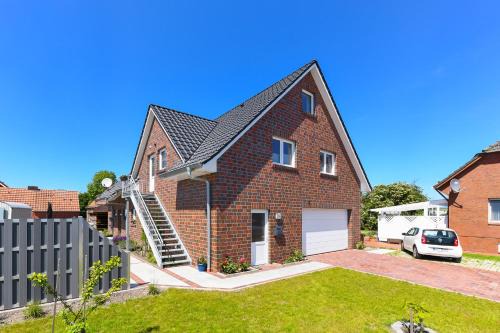 Neuharlingersiel Apartamento | Ferienwohnung im Haus Hafenlicht