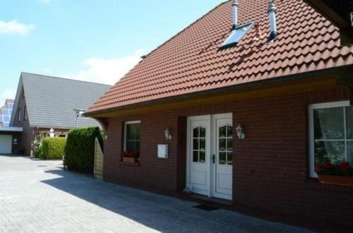 Nordseebad Burhave Apartamento | Ferienwohnung in Burhave mit Grill und Garten