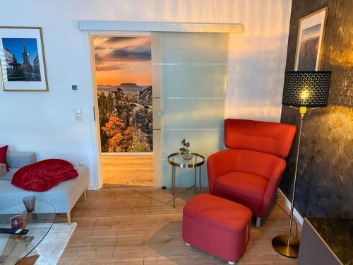 Krippen Apartamento | Ferienwohnung Lucy - Moderne Ferienwohnung mit kostenlosem Parkplatz, Terrasse, nahe Bad Schandau und Malerweg