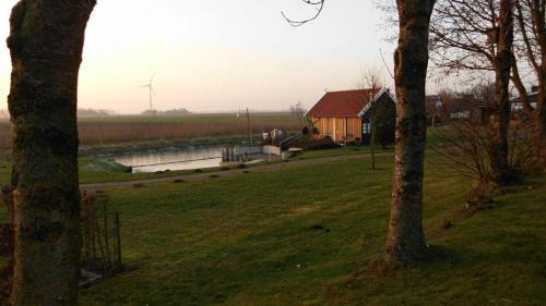 Altharlingersiel Apartamento | Ferienwohnung mit Terrasse und Parkplatz