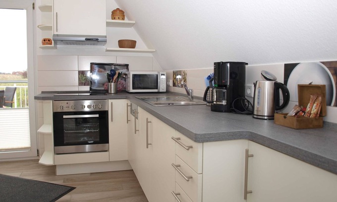 Gruenerdeich Apartamento | Ferienwohnung Oberland - Haus Helgoland