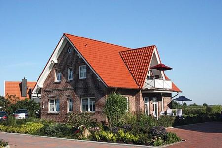 Neuharlingersiel Apartamento | Ferienwohnungen im Haus Ankerplatz am Süderriff