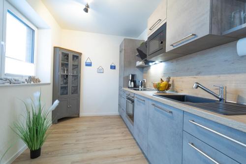 Dorumer Neufeld Apartamento | FeWo Seebrise mit Sauna und Balkon
