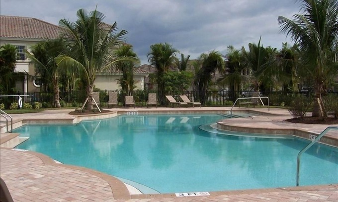 Naples Condominio | Fiddlers 'Creek Varenna Lakeside lujo con Ascensor Privado