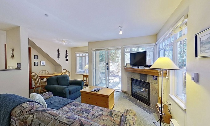 Village North Condominio | First-floor condo with fireplace & patio - walk or shuttle to ski lifts