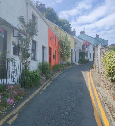 Mumbles Casa | Fishermen's cottage with log burner, 2 bathrooms & sea views from garden terraces