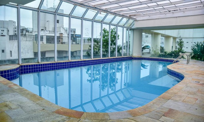 Morro do Maluf Apartamento | Flat c varanda na Praia de Pitangueiras-Guaruja SP