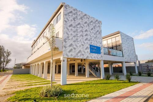 Jaguaruna Apartamento | Flats completos e modernos em Jaguaruna a 50m da Praia - PLO