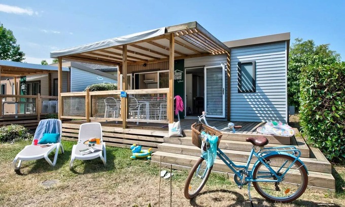 Saumur Casa | Flower Camping L'Ile d'Offard **** - Homeflower Premium 26.5m2 (2 bedrooms) + CLIM + semi-covered terrace + TV + sheets + towels 5 people
