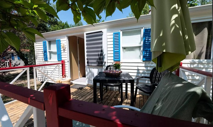 Die Casa | Flower Camping la Pinède **** - Mobile home Standard Getaway 23m2 - 2 bedrooms + Terrace with umbrella - 4 people