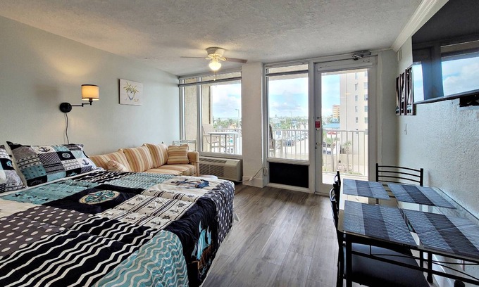 Daytona Beach Shores Condominio | FREE DAILY ACTIVITIES! Corner Unit w/Private Balcony to Catch the Action Overlooking City & Ocean!