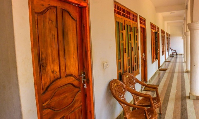 Uppuveli Hotel | French Garden Eagle wings Inn