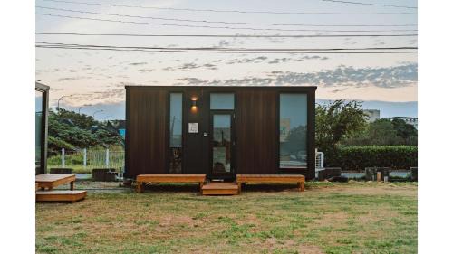 Fuxing Casa | Fulu Dragon Boat Camping House 1 by Tiny Away