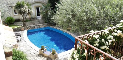 Saint-Genies-de-Malgoires Casa | Gîte familial 6 personnes climatisé, piscine partagée chauffée, proche Nîmes, Uzès, Pont du Gard, Cévennes