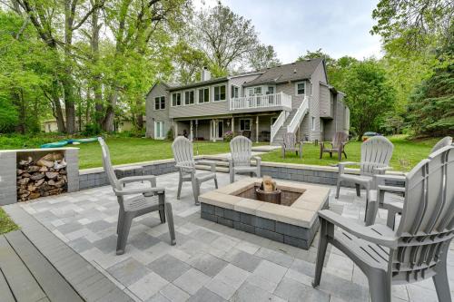 Commerce Township Casa | Game Room and Fire Pit Canal-Front Commerce Home