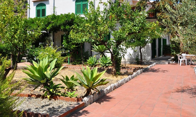 Mazzeo Apartamento | Casa de jardín en las playas más grandes de Taormina aparte. n. 1 en el paseo marítimo.