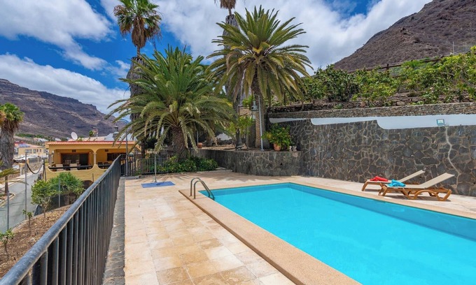 Mogan Casa | GC0284 Casa de vacaciones con piscina compartida en Mogán