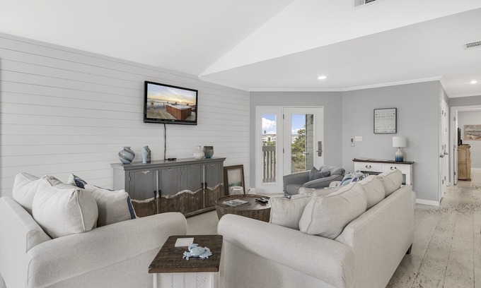 Holiday Isle Condominio | "Geaux Coastal" Holiday Isle Harbour Condo 2B / 2B con el uso de deslizamiento de barco
