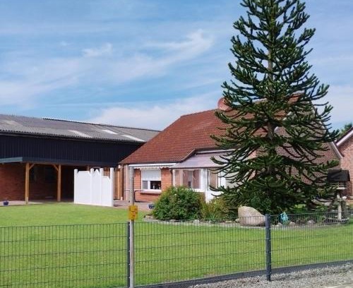 Weener Apartamento | Gemütliches Ferienhaus Lütje Huske mit Garten, 25666