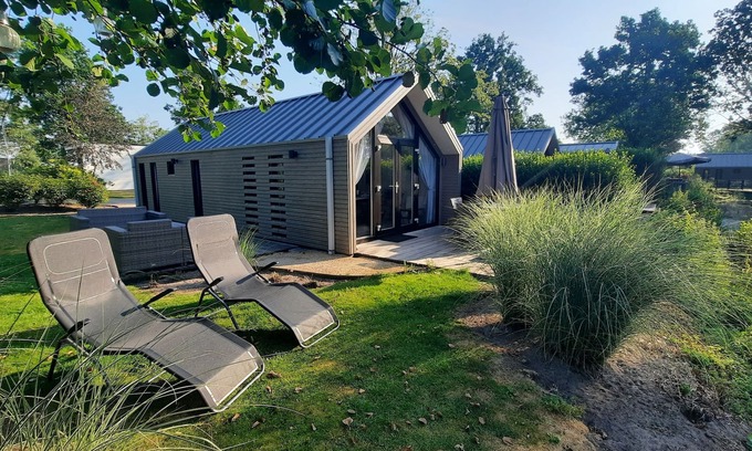Municipality of Dronten Chalet De Esquí | Gemütliches Holland-beachhouse 40m² mit Garten, Blick Aufs Wasser im Ferienpark