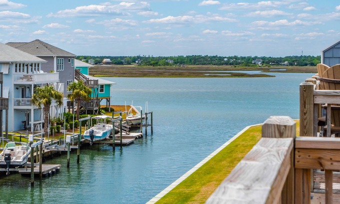 Topsail Beach Casa | Gemini Dream #102 - Soundfront w/ Pool, Boat Dock, Elevator, Dogs Allowed!