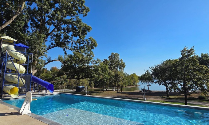 Grove Casa | Giant 10-bedroom lakefront home with large pool, hot tub, and dock