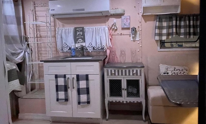 Tucson Cabaña | “Glamping” at its finest. Meet Genevieve, a restored 1959 Fan travel trailer.