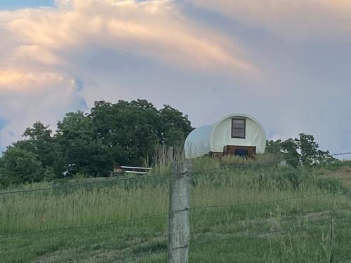 Glenwood Casa | Glenwood Glamping Vacations at this Charming Covered Wagon Rental in Iowa
