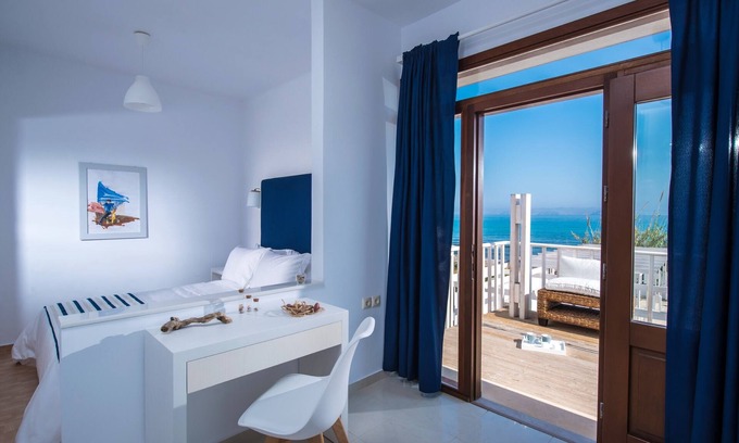 Kokkini Chani Casa | Golden Grain Suites by Checkin