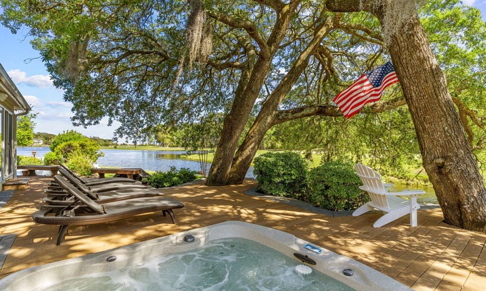 Sea Trail Casa | Gorgeous waterfront home with private hot tub, pool, views, deck, & fireplace