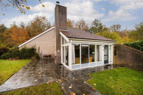 Zwiggelte Casa | Goudvink I Huis met Excentrieke Tuin