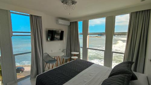 Morro do Maluf Hotel | Grand Hotel Guarujá - A sua Melhor Experiência Beira Mar na Praia!