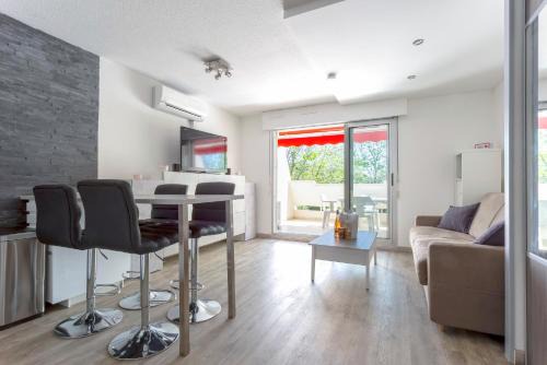 Le Couchant Apartamento | Grand studio climatisé à la mer avec garage privé