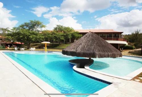 Saire Apartamento | GRAVATÁ - FLAT PREMIUM NO MONTE CASTELO - quarto superior com Wi-Fi e netflix