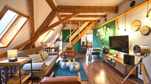 Fluorn Apartamento | Green Loft Schwarzwald - Dach-Balkon-Musik-Ecke