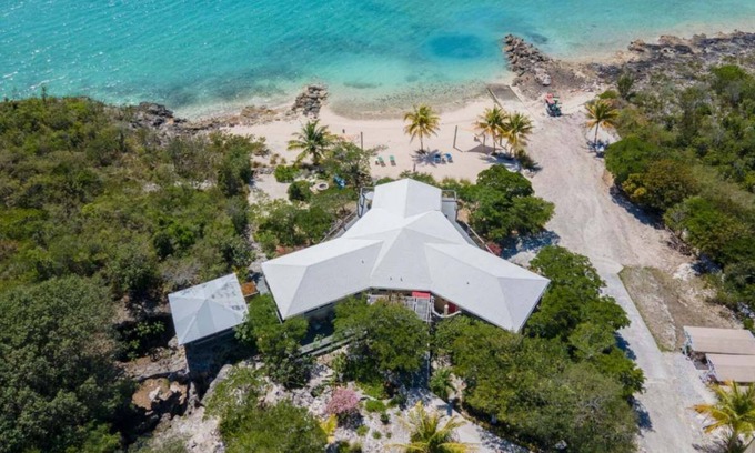 Salt Pond Casa | Grotto Bay: 5BR Villa w/ Private Beach