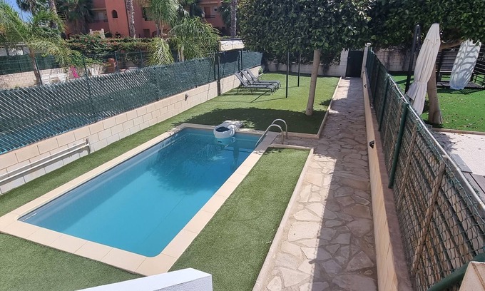 Playa de Vera Apartamento | Apartamentos Paraiso, Bajo B a pie de playa, piscina privada con jardín, WIFI