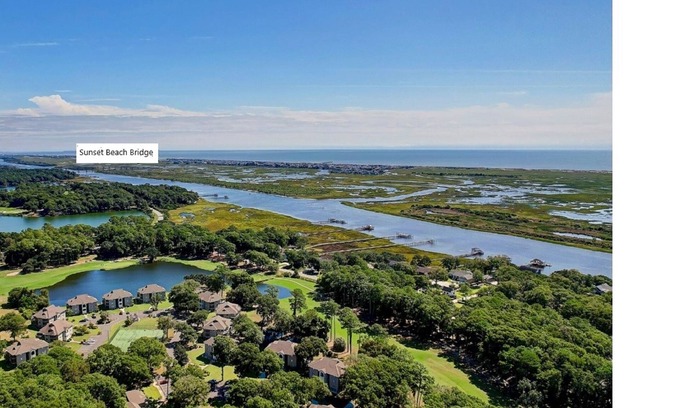 Sea Trail Condominio | Ground Floor/End Unit on Hole #2 Oyster Bay - Golfers Dream / Family Getaway