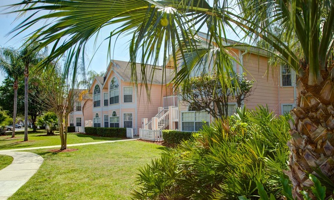 Royal Palm Bay Condominio | Ground floor, With a pond view patio.