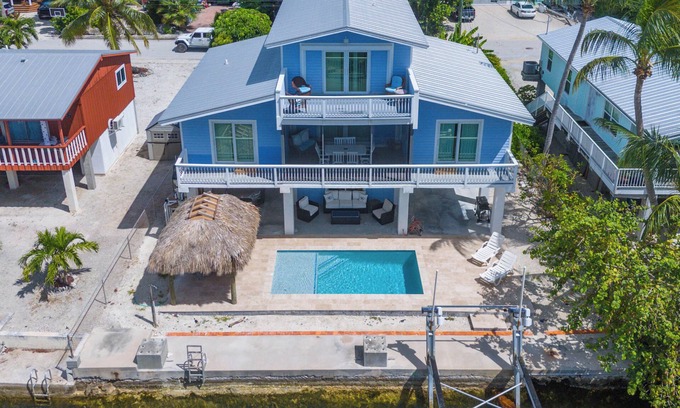 Cutthroat Harbor Estates Casa | Group Therapy Waterfront Keys Home – Pool, Tiki Hut, Dockage, & Monthly Rentals