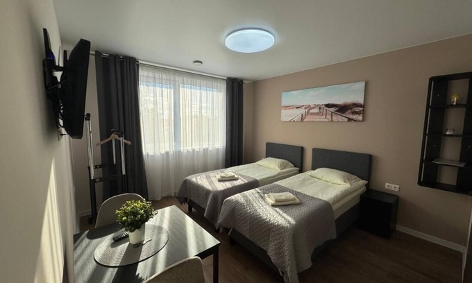 Siauliai Apartamento | ¡La casa de huéspedes "IMPERIA" le garantizará una estancia acogedora!